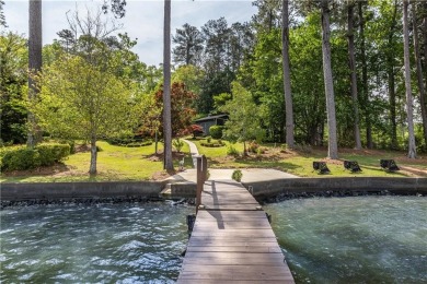 Perched above one of the widest sections of Jackson Lake, this on Turtle Cove Golf Course in Georgia - for sale on GolfHomes.com, golf home, golf lot