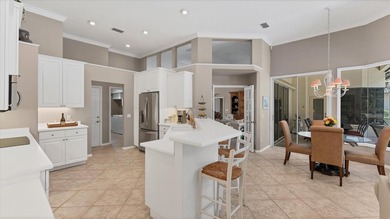 Under contract-accepting backup offers. Located in the charming on University Park Country Club in Florida - for sale on GolfHomes.com, golf home, golf lot