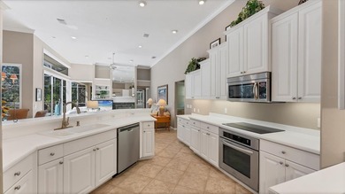 Under contract-accepting backup offers. Located in the charming on University Park Country Club in Florida - for sale on GolfHomes.com, golf home, golf lot