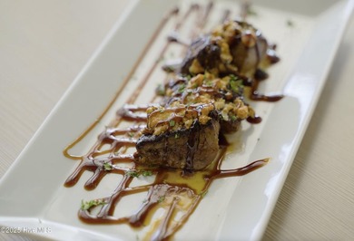 Experience the perfect blend of comfort, style, and golf course on North River Club in North Carolina - for sale on GolfHomes.com, golf home, golf lot