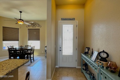 A Stunning RV Garage Pool Home in Lake Havasu City. Nestled on a on London Bridge Golf Course in Arizona - for sale on GolfHomes.com, golf home, golf lot