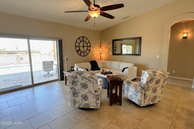 A Stunning RV Garage Pool Home in Lake Havasu City. Nestled on a on London Bridge Golf Course in Arizona - for sale on GolfHomes.com, golf home, golf lot