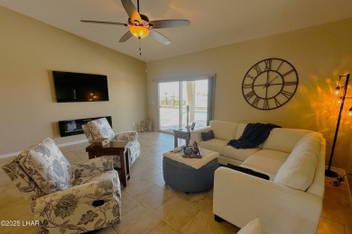 A Stunning RV Garage Pool Home in Lake Havasu City. Nestled on a on London Bridge Golf Course in Arizona - for sale on GolfHomes.com, golf home, golf lot