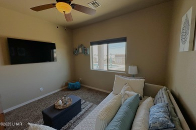 A Stunning RV Garage Pool Home in Lake Havasu City. Nestled on a on London Bridge Golf Course in Arizona - for sale on GolfHomes.com, golf home, golf lot