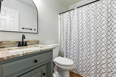 This traditional home located on a quiet street in the Country on The Country Club of Arkansas in Arkansas - for sale on GolfHomes.com, golf home, golf lot