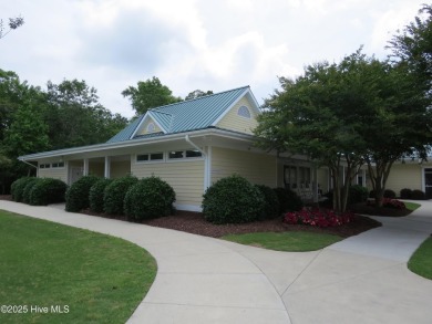 This golf course lot looks down the first fairway of the Ibis on Carolina National Golf Club in North Carolina - for sale on GolfHomes.com, golf home, golf lot
