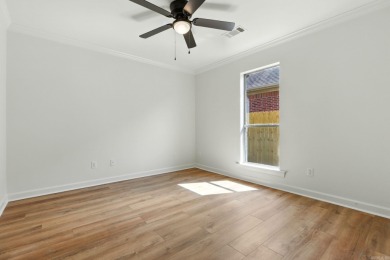 This traditional home located on a quiet street in the Country on The Country Club of Arkansas in Arkansas - for sale on GolfHomes.com, golf home, golf lot