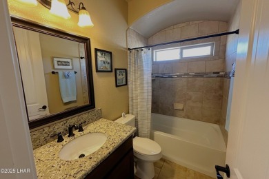 A Stunning RV Garage Pool Home in Lake Havasu City. Nestled on a on London Bridge Golf Course in Arizona - for sale on GolfHomes.com, golf home, golf lot