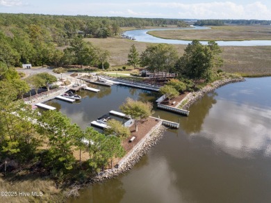 This golf course lot looks down the first fairway of the Ibis on Carolina National Golf Club in North Carolina - for sale on GolfHomes.com, golf home, golf lot