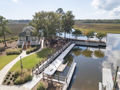 This golf course lot looks down the first fairway of the Ibis on Carolina National Golf Club in North Carolina - for sale on GolfHomes.com, golf home, golf lot