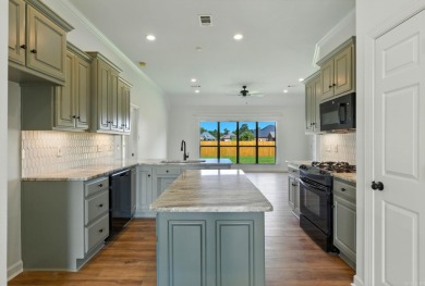 This traditional home located on a quiet street in the Country on The Country Club of Arkansas in Arkansas - for sale on GolfHomes.com, golf home, golf lot
