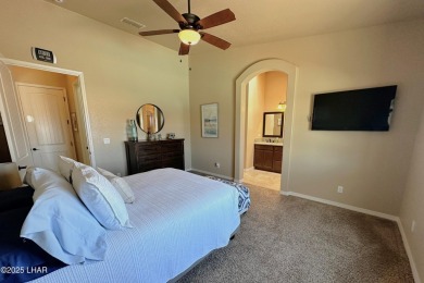 A Stunning RV Garage Pool Home in Lake Havasu City. Nestled on a on London Bridge Golf Course in Arizona - for sale on GolfHomes.com, golf home, golf lot