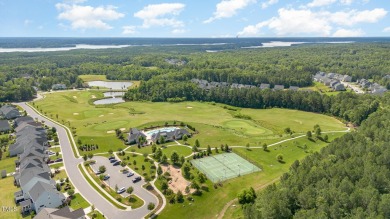 **Welcome Home!** Discover your dream residence in the heart of on The Preserve At Jordan Lake Golf Club in North Carolina - for sale on GolfHomes.com, golf home, golf lot