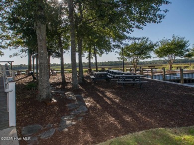 This golf course lot looks down the first fairway of the Ibis on Carolina National Golf Club in North Carolina - for sale on GolfHomes.com, golf home, golf lot