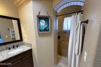 A Stunning RV Garage Pool Home in Lake Havasu City. Nestled on a on London Bridge Golf Course in Arizona - for sale on GolfHomes.com, golf home, golf lot