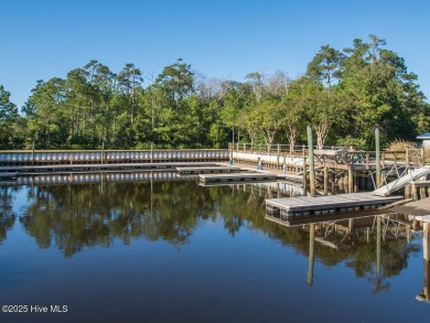 This golf course lot looks down the first fairway of the Ibis on Carolina National Golf Club in North Carolina - for sale on GolfHomes.com, golf home, golf lot