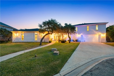 Welcome to 2110 Harbor Ct, a custom waterfront retreat located on Rockport Country Club in Texas - for sale on GolfHomes.com, golf home, golf lot