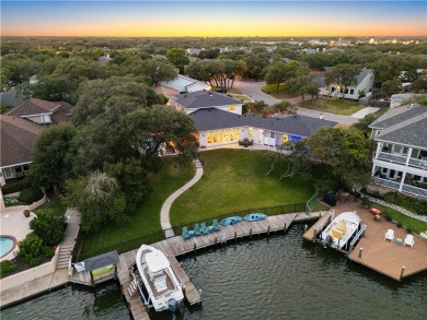Welcome to 2110 Harbor Ct, a custom waterfront retreat located on Rockport Country Club in Texas - for sale on GolfHomes.com, golf home, golf lot