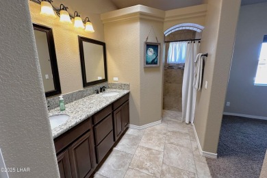 A Stunning RV Garage Pool Home in Lake Havasu City. Nestled on a on London Bridge Golf Course in Arizona - for sale on GolfHomes.com, golf home, golf lot