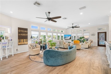 Welcome to 2110 Harbor Ct, a custom waterfront retreat located on Rockport Country Club in Texas - for sale on GolfHomes.com, golf home, golf lot