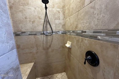 A Stunning RV Garage Pool Home in Lake Havasu City. Nestled on a on London Bridge Golf Course in Arizona - for sale on GolfHomes.com, golf home, golf lot