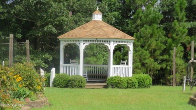 This golf course lot looks down the first fairway of the Ibis on Carolina National Golf Club in North Carolina - for sale on GolfHomes.com, golf home, golf lot