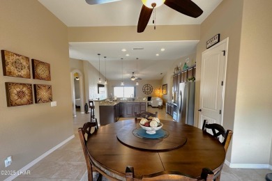 A Stunning RV Garage Pool Home in Lake Havasu City. Nestled on a on London Bridge Golf Course in Arizona - for sale on GolfHomes.com, golf home, golf lot