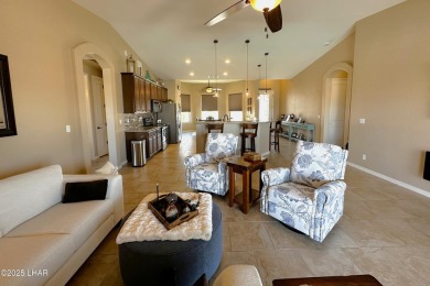 A Stunning RV Garage Pool Home in Lake Havasu City. Nestled on a on London Bridge Golf Course in Arizona - for sale on GolfHomes.com, golf home, golf lot