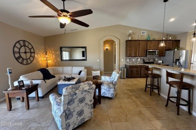 A Stunning RV Garage Pool Home in Lake Havasu City. Nestled on a on London Bridge Golf Course in Arizona - for sale on GolfHomes.com, golf home, golf lot