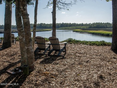 This golf course lot looks down the first fairway of the Ibis on Carolina National Golf Club in North Carolina - for sale on GolfHomes.com, golf home, golf lot