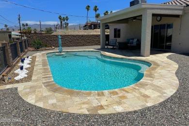 A Stunning RV Garage Pool Home in Lake Havasu City. Nestled on a on London Bridge Golf Course in Arizona - for sale on GolfHomes.com, golf home, golf lot