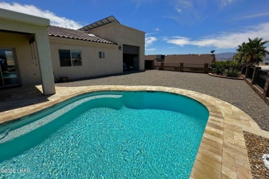 A Stunning RV Garage Pool Home in Lake Havasu City. Nestled on a on London Bridge Golf Course in Arizona - for sale on GolfHomes.com, golf home, golf lot