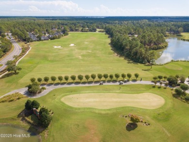 This golf course lot looks down the first fairway of the Ibis on Carolina National Golf Club in North Carolina - for sale on GolfHomes.com, golf home, golf lot