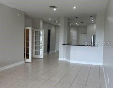 Experience golf course living in one of Lakeland's most on Grasslands Golf and Country Club in Florida - for sale on GolfHomes.com, golf home, golf lot