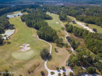 This golf course lot looks down the first fairway of the Ibis on Carolina National Golf Club in North Carolina - for sale on GolfHomes.com, golf home, golf lot