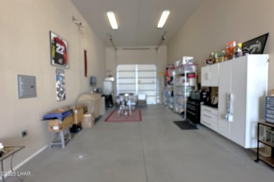 A Stunning RV Garage Pool Home in Lake Havasu City. Nestled on a on London Bridge Golf Course in Arizona - for sale on GolfHomes.com, golf home, golf lot