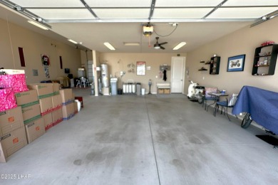 A Stunning RV Garage Pool Home in Lake Havasu City. Nestled on a on London Bridge Golf Course in Arizona - for sale on GolfHomes.com, golf home, golf lot