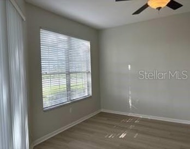 Experience golf course living in one of Lakeland's most on Grasslands Golf and Country Club in Florida - for sale on GolfHomes.com, golf home, golf lot