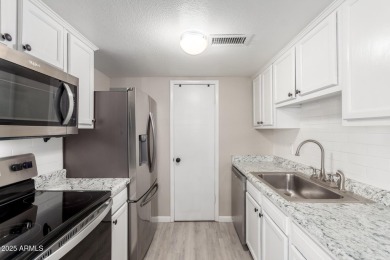 Welcome to this bright and fresh 3-bedroom, 1.5-bathroom on Scottsdale Silverado Golf Club in Arizona - for sale on GolfHomes.com, golf home, golf lot