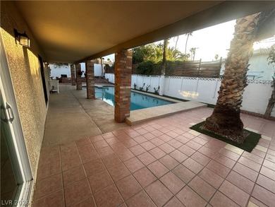 Discover this beautifully updated home in the legendary Paradise on Las Vegas National Golf Club in Nevada - for sale on GolfHomes.com, golf home, golf lot
