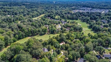 Welcome home to this luxurious spacious gem in the beautiful on Forest Oaks Country Club in North Carolina - for sale on GolfHomes.com, golf home, golf lot