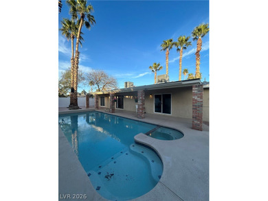 Discover this beautifully updated home in the legendary Paradise on Las Vegas National Golf Club in Nevada - for sale on GolfHomes.com, golf home, golf lot
