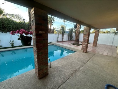 Discover this beautifully updated home in the legendary Paradise on Las Vegas National Golf Club in Nevada - for sale on GolfHomes.com, golf home, golf lot