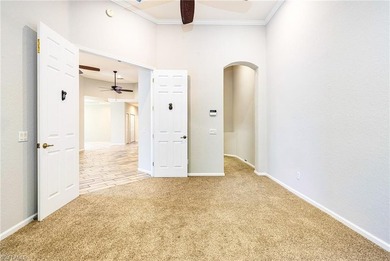 Step into a home that feels equal parts refined and on West Bay Beach and Golf Club in Florida - for sale on GolfHomes.com, golf home, golf lot