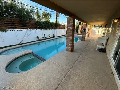 Discover this beautifully updated home in the legendary Paradise on Las Vegas National Golf Club in Nevada - for sale on GolfHomes.com, golf home, golf lot