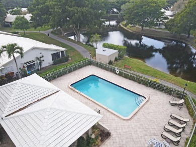 This Piece of Paradise is Perfect for Entertaining or just on The Country Club At Boca Raton in Florida - for sale on GolfHomes.com, golf home, golf lot