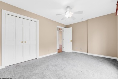 Welcome to your dream home nestled in the serene and on Mountain View Golf Course in West Virginia - for sale on GolfHomes.com, golf home, golf lot