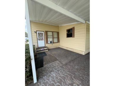 Welcome to this beautifully maintained 2/2 home where you will on Lake Henry Golf Club in Florida - for sale on GolfHomes.com, golf home, golf lot