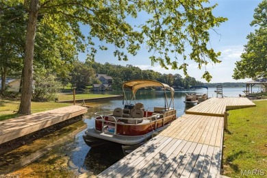 Vacation Living Every Day! Looking for the perfect second home on Terre Du Lac Golf and Country Club in Missouri - for sale on GolfHomes.com, golf home, golf lot