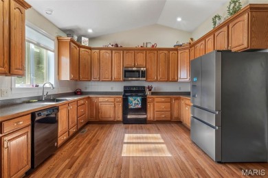 Vacation Living Every Day! Looking for the perfect second home on Terre Du Lac Golf and Country Club in Missouri - for sale on GolfHomes.com, golf home, golf lot